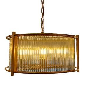 Gold pendant light with glass shade
