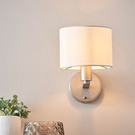 Daley Brushed Matt Nickel Wall Light on cream wall above glass, LHEND61608, wall light,