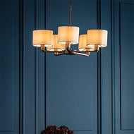 Daley 5 Light Dark Antique Bronze Pendant above flowers in blue walled room, LHEND73017, ceiling light,