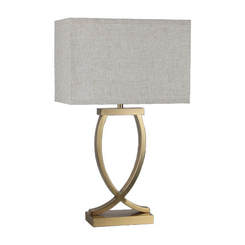 A rectangular fabric table lamp shade in beige color, with an antique brass base and a 3-pin plug.