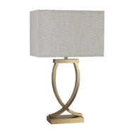 A rectangular fabric table lamp shade in beige color, with an antique brass base and a 3-pin plug.