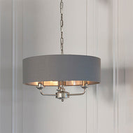 Highclere 3LT Nickel/Charcoal Pendant hanging from ceiling in white walled room, LHEND94377, ceiling light, 