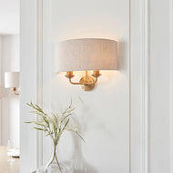 Highclere 2LT Vintage Brass Wall Light on hallway wall with glass vase underneath it, LHEND110726, wall light,