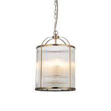 Load image into Gallery viewer, Pendant light with glass shade and brass fixture on a white background. LHEND106711
