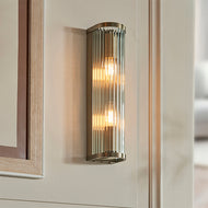 Wall-mounted cylindrical light fixture with reflective glass on a neutral wall, Ridgeton 2 Light Antique Brass Wall Light, LHEND118597, wall light, 
