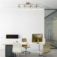 Samson 4 Light Antique Brass Metal Split Bar Spotlight in office setting above desk with chairs, LHSL6604AB, ceiling light, 