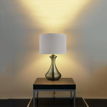 Load image into Gallery viewer, Touch Table Lamp - Antique Brass Metal &amp; Ivory Fabric Shade In Use

