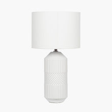 Load image into Gallery viewer, This beautiful tall ceramic table lamp features a textured tactile detail. Finished in a simple white glaze this lamp also comes complete with a matching white shade to finish the clean neutral look.
